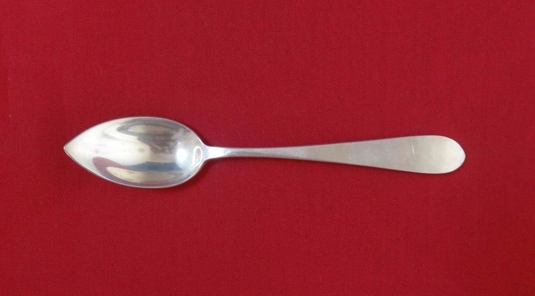 Gorham Plain Sterling Silver Grapefruit Spoon 5.75 inch: Gorham Plain Sterling Silver Grapefruit Spoon 5.75 inch This exquisite Gorham Plain grapefruit spoon is crafted from high-quality sterling silver and measures 5 3/4 inches in length. The spoon showcas