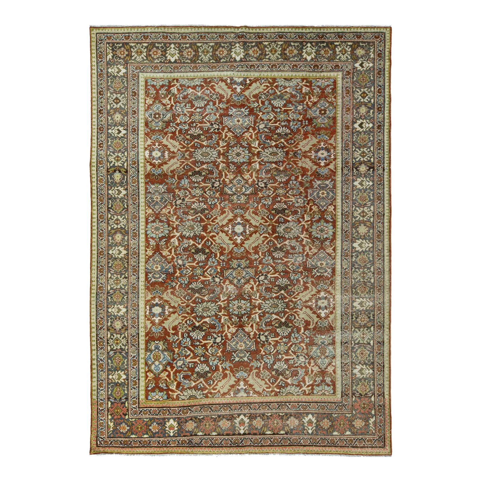Vintage Handmade Mahal Rust Wool Rug 7'2 x 10'2 Floral Motif: Vintage Handmade Mahal Rust Wool Rug 7'2 x 10'2 Floral Motif This exquisite Antique Mahal hand-knotted wool rug features a stunning rust field embellished with a captivating floral motif in shades of