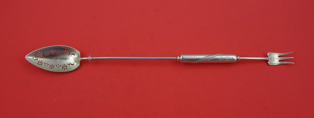 Gorham Number 74 Wheat Sterling Silver Olive Pickle Spear 10 3/8 Inch: Gorham Number 74 Wheat Sterling Silver Olive Pickle Spear 10 3/8 Inch Discover the exquisite Number 74 Wheat Olive/Pickle Spear by Gorham, crafted from sterling silver with a light vermeil finish. Thi