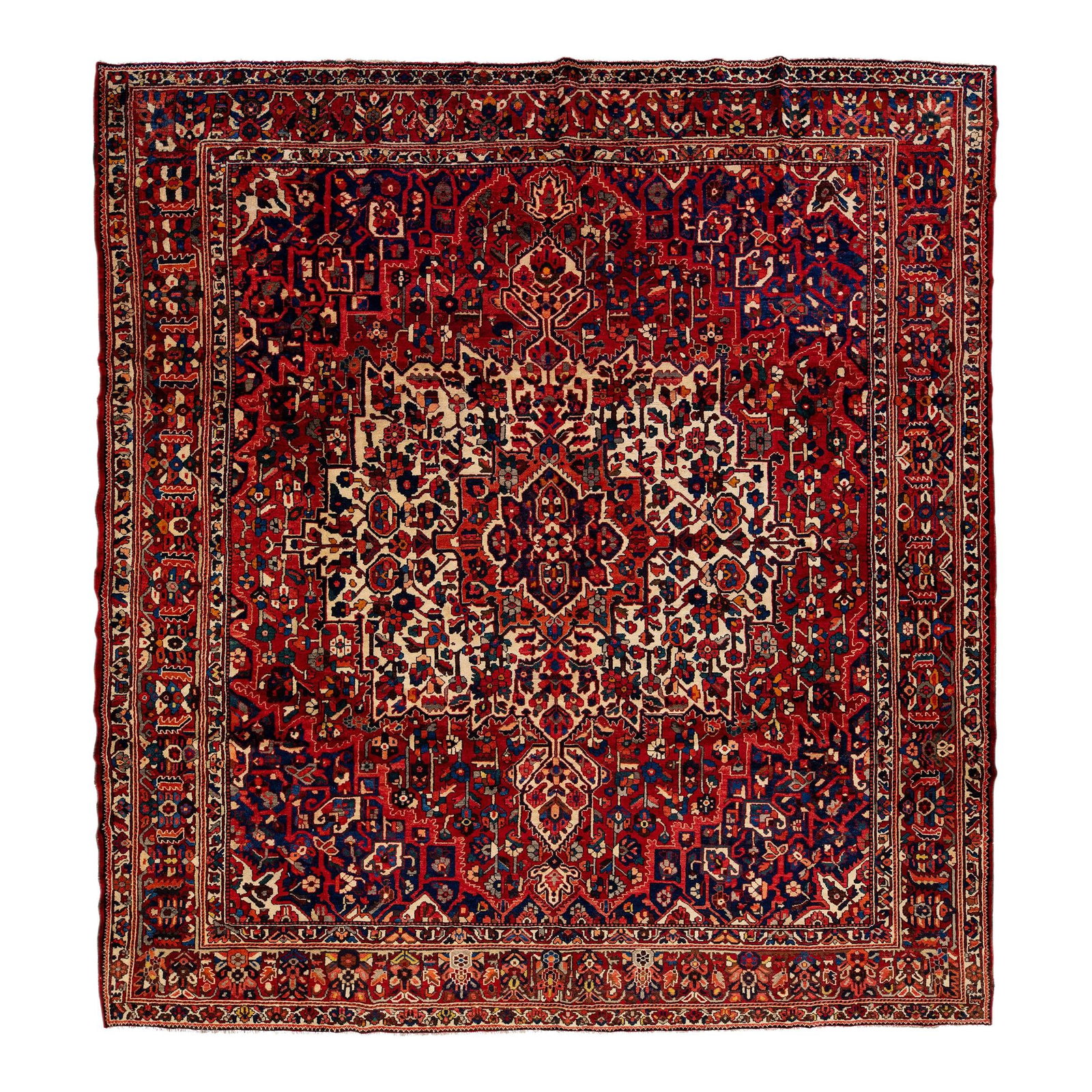 Vintage Heriz Handmade Wool Rug 12'3 x 13'1 Red Medallion: Vintage Heriz Handmade Wool Rug 12'3 x 13'1 Red Medallion This stunning vintage Heriz rug showcases a rich red field adorned with a beautifully intricate all-over geometric floral medallion design. Ha