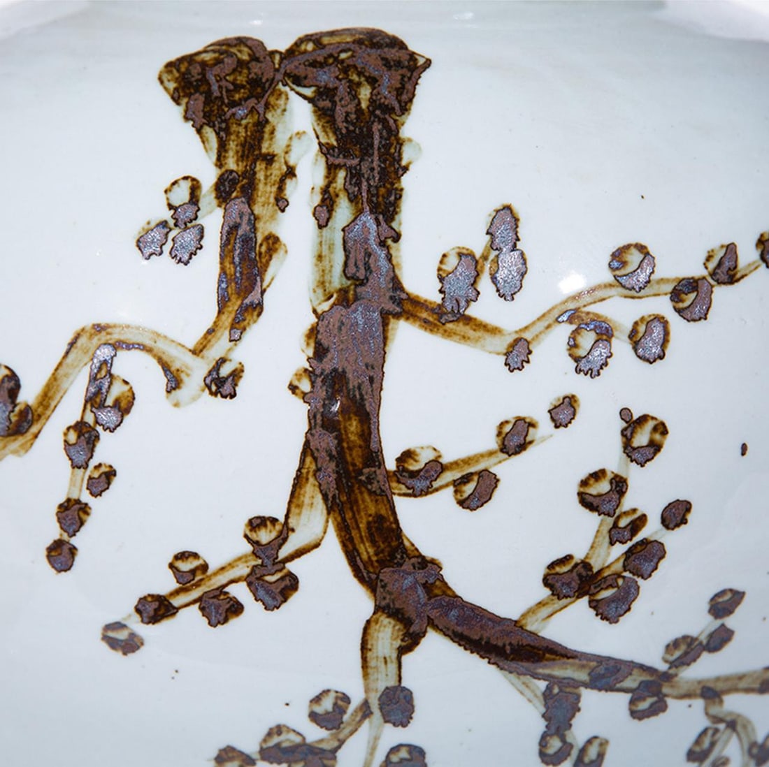 Rustic Ceramic Weeping Plum Handcrafted Jar 12H x 13W x 13D: Rustic Ceramic Weeping Plum Handcrafted Jar 12H x 13W x 13D This elegant handcrafted Weeping Plum jar is a stunning addition to any rustic decor. Made from ceramic with a unique rusty brown finish, it