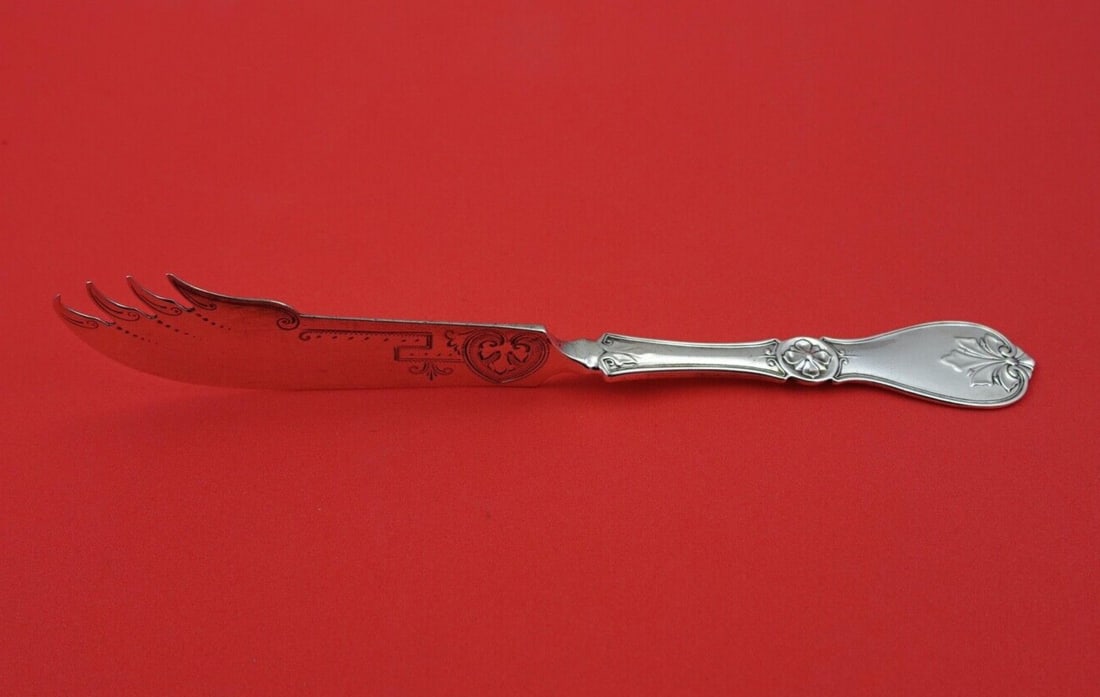 Coin Silver Cheese Knife Sterling Brite-Cut Flat Handle 7.5": Coin Silver Cheese Knife Sterling Brite-Cut Flat Handle 7.5" This exquisite cheese knife features a brite-cut design and is crafted from coin silver by various makers. The flat handle is made entirely