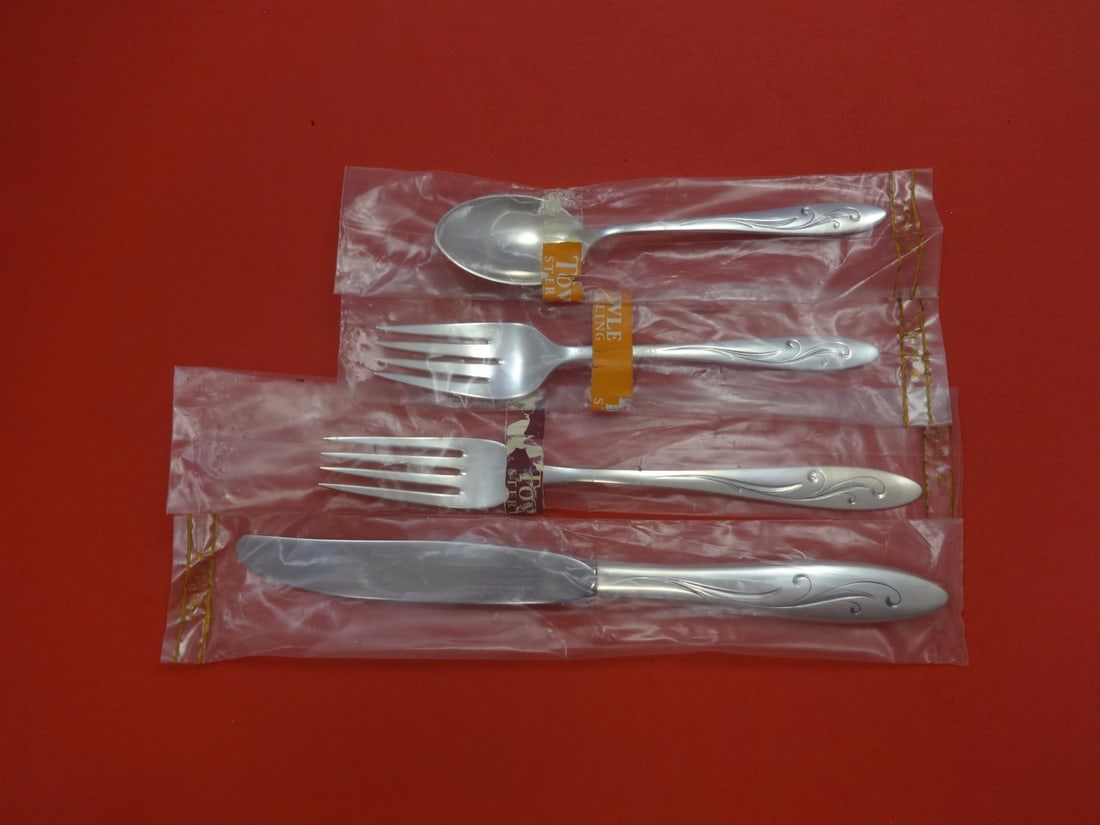 Towle Awakening Sterling Silver 4-Piece Place Setting New: Towle Awakening Sterling Silver 4-Piece Place Setting New Introducing the Awakening 4-piece regular size place setting by Towle, crafted from high-quality sterling silver. This elegant set features a