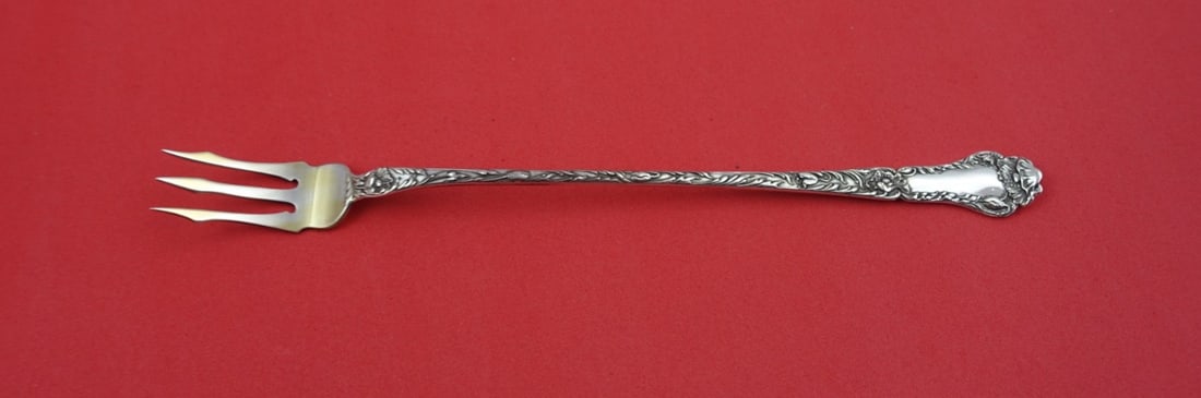 Gorham Poppy Sterling Silver Pickle Fork 8 1/4" Gold Washed: Gorham Poppy Sterling Silver Pickle Fork 8 1/4" Gold Washed This exquisite Poppy pickle fork by Gorham is crafted from high-quality sterling silver, showcasing the elegant Poppy pattern. With a genero