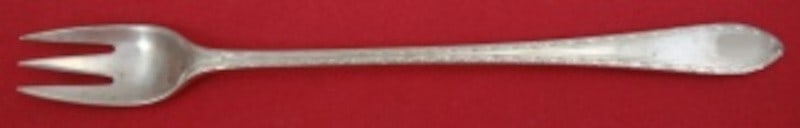 Tiffany & Co Feather Edge Sterling Silver Cocktail Fork 6 Inch: Tiffany & Co Feather Edge Sterling Silver Cocktail Fork 6 Inch Enhance your dining experience with this exquisite Feather Edge cocktail fork by Tiffany & Co. Crafted from high-quality sterling silver,