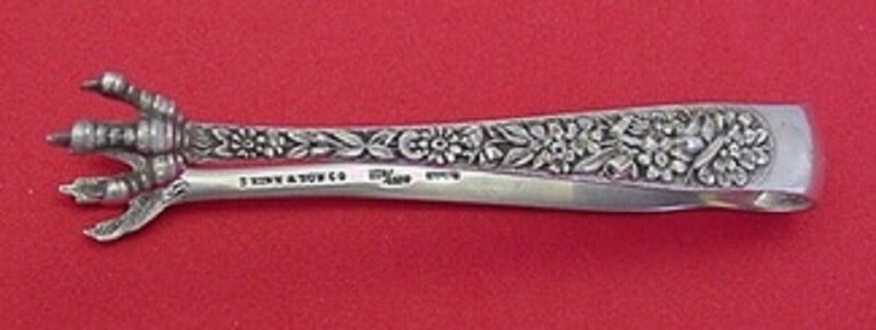 Kirk Repousse Sterling Silver Sugar Tong 4 Inch Serving Piece: Kirk Repousse Sterling Silver Sugar Tong 4 Inch Serving Piece Enhance your serving collection with this exquisite sterling silver sugar tong from Kirk, designed in the classic Repousse pattern. Measur