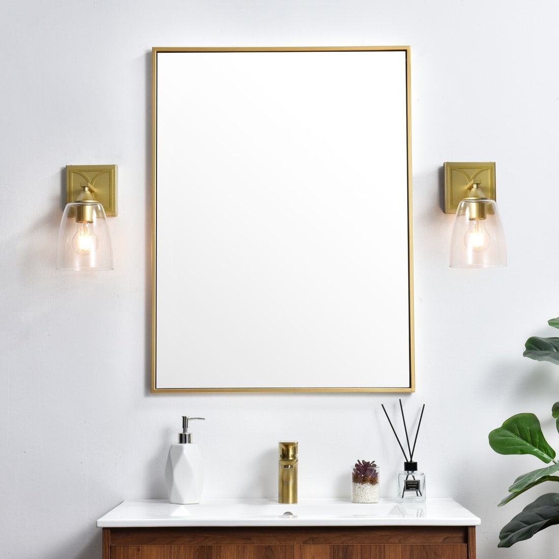 Harris Modern Brass Glass Wall Sconce Light For Bedroom Or Bathroom: Harris Modern Brass Glass Wall Sconce Light For Bedroom Or Bathroom This modern wall sconce features a brass color finish and a dome-shaped clear glass shade, offering versatile illumination suitable