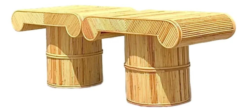 Set of Two Rattan Scroll Top Column Side Tables with Pencil Reed Finish: Set of Two Rattan Scroll Top Column Side Tables with Pencil Reed Finish This pair of vintage side tables showcases a distinctive blend of 1970s Organic Modernism and Hollywood Regency style. Handcraft