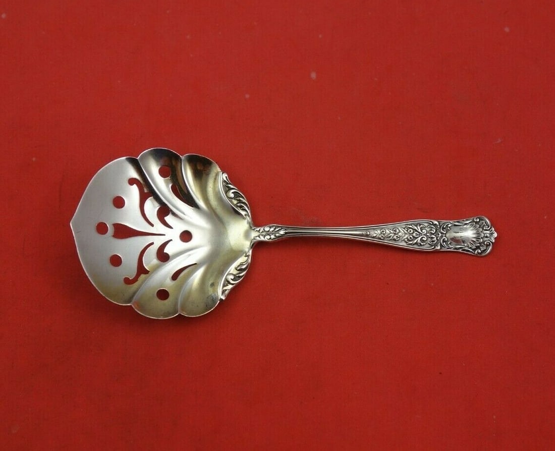 Gorham Maryland 4 5/8 Inch Sterling Silver Nut Spoon: Gorham Maryland 4 5/8 Inch Sterling Silver Nut Spoon This exquisite Maryland nut spoon, crafted by Gorham, showcases the elegance of sterling silver. Measuring 4 5/8 inches, this serving spoon feature