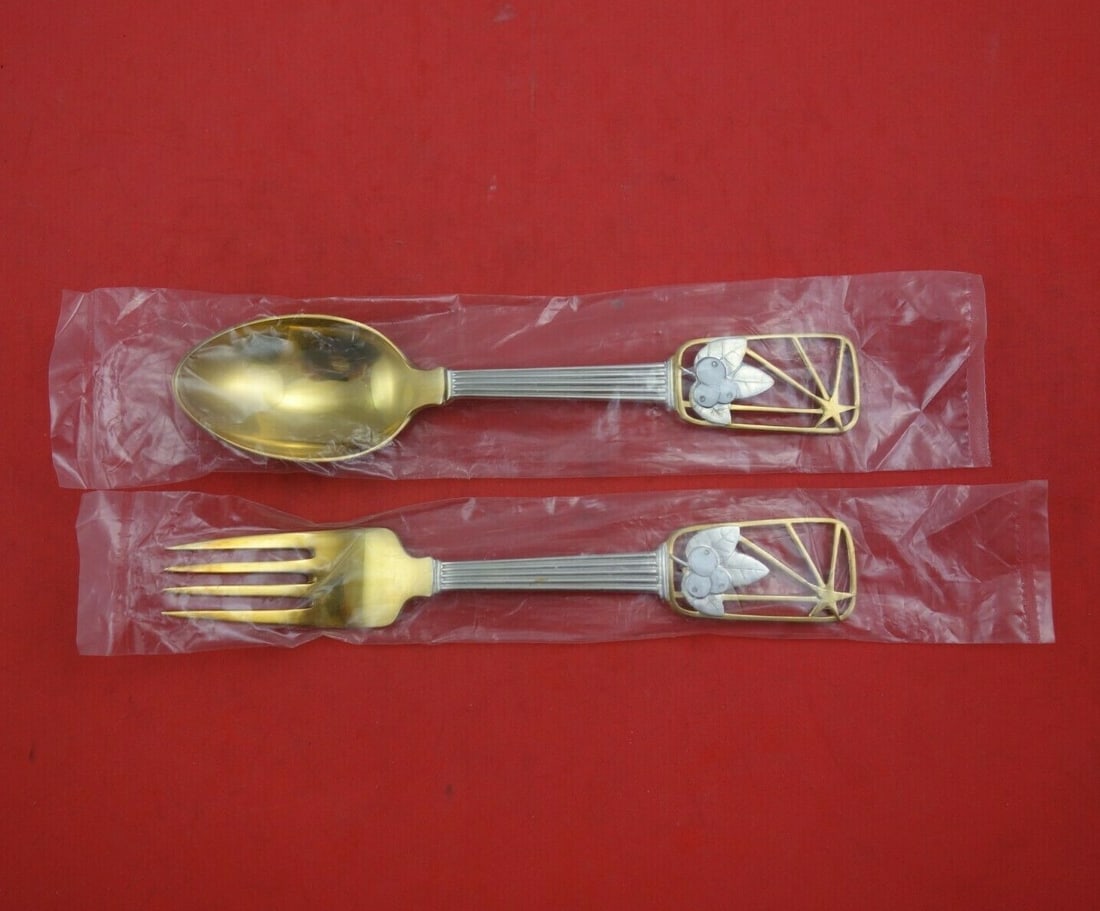 A. Michelsen 1938 Christmas Sterling Silver Vermeil Fork Spoon Set 2pc: A. Michelsen 1938 Christmas Sterling Silver Vermeil Fork Spoon Set 2pc Elevate your holiday dining with this exquisite 2-piece fork and spoon set from A. Michelsen, crafted in sterling silver with a s