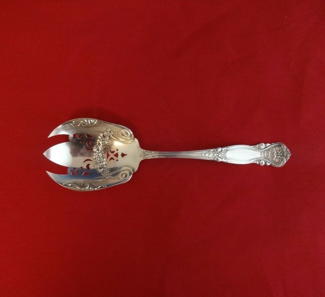 Mauser-Wendell Emperor Sterling Silver Salad Serving Fork Pierced 7 3/4": Mauser-Wendell Emperor Sterling Silver Salad Serving Fork Pierced 7 3/4" This elegant salad serving fork is part of the Emperor pattern by Mauser-Wendell, crafted from high-quality sterling silver. Me