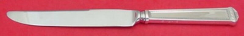 Tuttle Pantheon Sterling Silver Dinner Knife 9 5/8 Inch: Tuttle Pantheon Sterling Silver Dinner Knife 9 5/8 Inch Experience elegance at your dining table with the Pantheon by Tuttle Sterling Silver Dinner Knife. Measuring 9 5/8 inches, this exquisite knife
