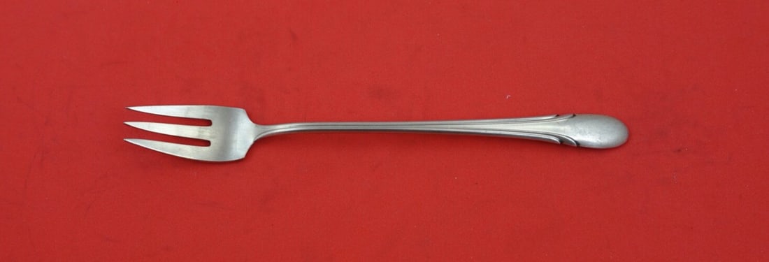 Towle Symphony Chased Sterling Silver Cocktail Fork 5 3/4": Towle Symphony Chased Sterling Silver Cocktail Fork 5 3/4" This exquisite cocktail fork features the Symphony Chased pattern by Towle, crafted from high-quality sterling silver. Measuring 5 3/4" in le