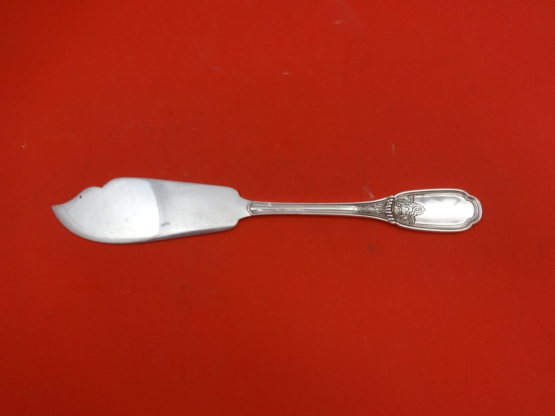 Souche-Lapparra Blois Sterling Silver Butter Spreader 6 3/4" Knife: Souche-Lapparra Blois Sterling Silver Butter Spreader 6 3/4" Knife This elegant butter spreader features a flat handle design and is crafted from high-quality sterling silver. The piece measures 6 3/4
