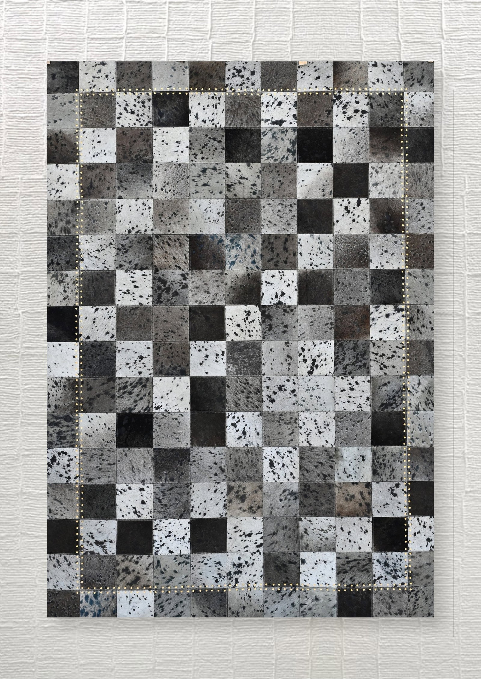 Handmade Oversized Houndstooth Patchwork Cowhide Leather Area Rug 3ft x 5ft: Handmade Oversized Houndstooth Patchwork Cowhide Leather Area Rug 3ft x 5ft Free continental US Shipping This handmade area rug features an oversized houndstooth weave patchwork crafted from 100% genu