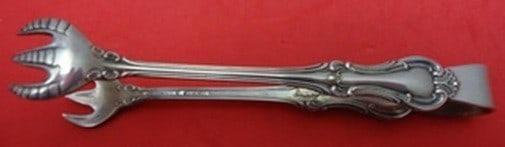 Sterling Silver Sugar Tong Joan of Arc Pattern by International 4 1/8 Inch: Sterling Silver Sugar Tong Joan of Arc Pattern by International 4 1/8 Inch This is a sterling silver sugar tong in the Joan of Arc pattern by International Silver. Measuring 4 1/8 inches, it is not mo