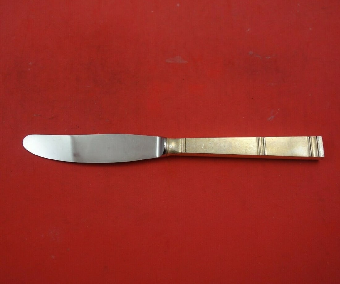 Grann and Laglye Cardinal Sterling Silver Long Knife 8 1/4": Grann and Laglye Cardinal Sterling Silver Long Knife 8 1/4" This exquisite long knife features a hollow handle crafted from sterling silver, showcasing the elegant Cardinal pattern by Grann and Laglye