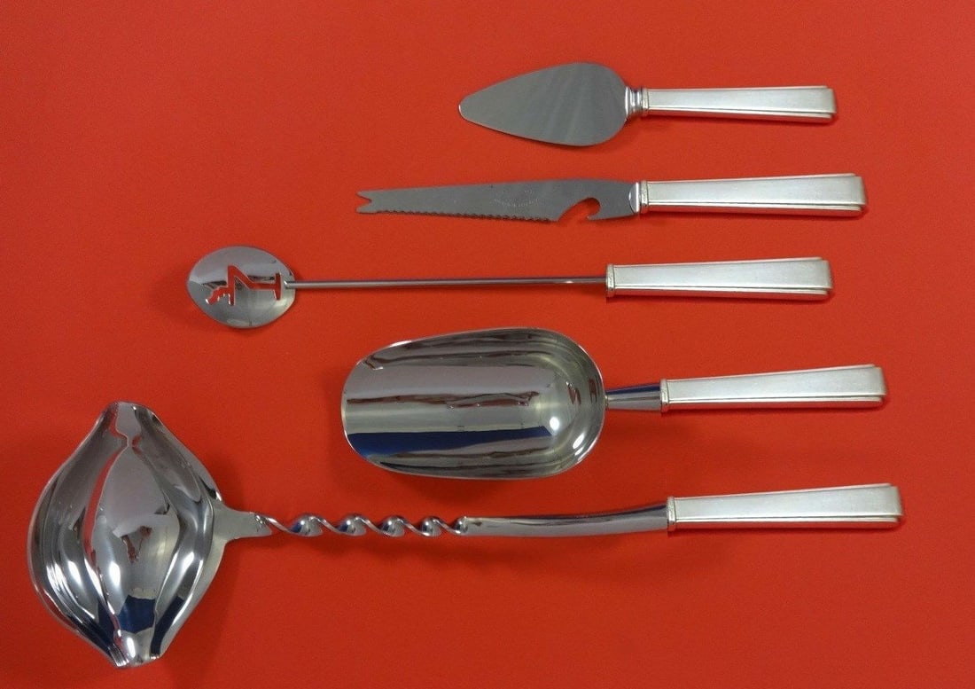 Lunt Modern Classic Sterling Silver 5pc Cocktail Party Set: Lunt Modern Classic Sterling Silver 5pc Cocktail Party Set Elevate your cocktail gatherings with this exquisite 5-piece cocktail party bar set from Lunt, featuring the elegant Modern Classic pattern.