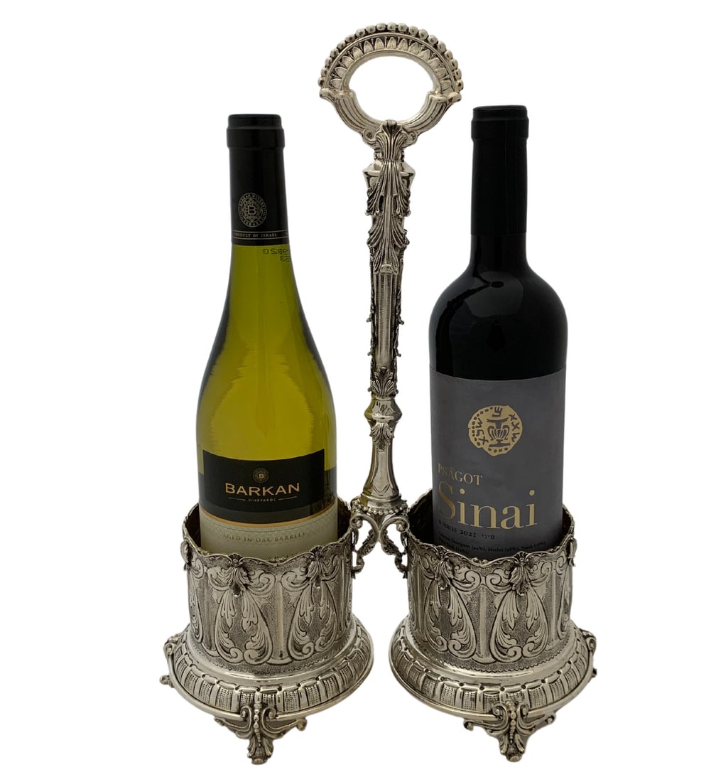 Handmade 925 Sterling Silver Double Wine Bottle Holder Leaf Design: Handmade 925 Sterling Silver Double Wine Bottle Holder Leaf Design Elevate your hosting experience with this exquisite 925 Sterling Silver Handmade Double Wine Bottle Holder. Crafted in Turkey, this s