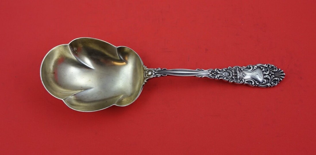 Dominick & Haff Renaissance Sterling Silver Berry Spoon 3-Lobbed Gold Wash 9": Dominick & Haff Renaissance Sterling Silver Berry Spoon 3-Lobbed Gold Wash 9" This exquisite Berry Spoon is part of the Renaissance pattern by Dominick & Haff, crafted from high-quality sterling silve