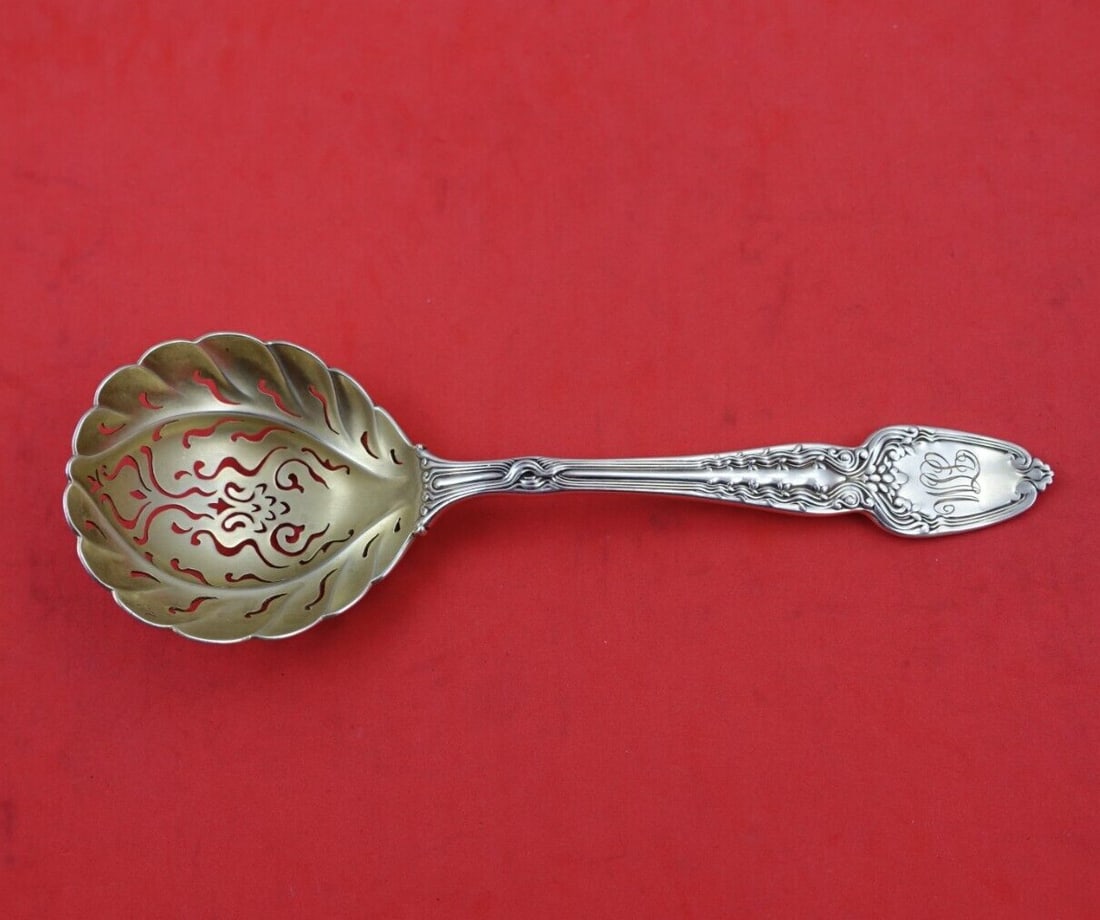 Tiffany & Co Broom Corn Sterling Silver Sugar Sifter Slotted Spoon: Tiffany & Co Broom Corn Sterling Silver Sugar Sifter Slotted Spoon This exquisite sugar sifter from Tiffany & Co. features the elegant Broom Corn pattern, masterfully crafted in sterling silver. The s