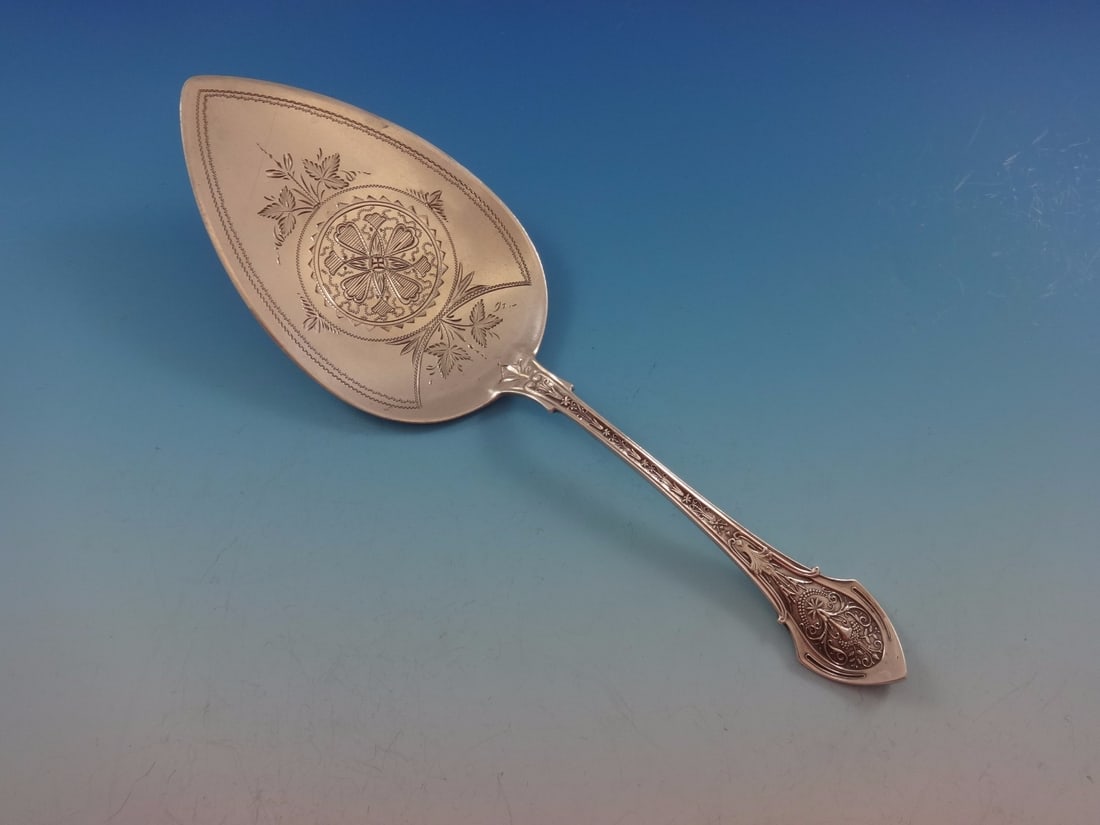 Wood & Hughes Angelo Sterling Silver Pie Server 7 7/8 Inch: Wood & Hughes Angelo Sterling Silver Pie Server 7 7/8 Inch This exquisite pie server from the Angelo pattern, crafted by Wood & Hughes, showcases a classic design made of high-quality sterling silver.