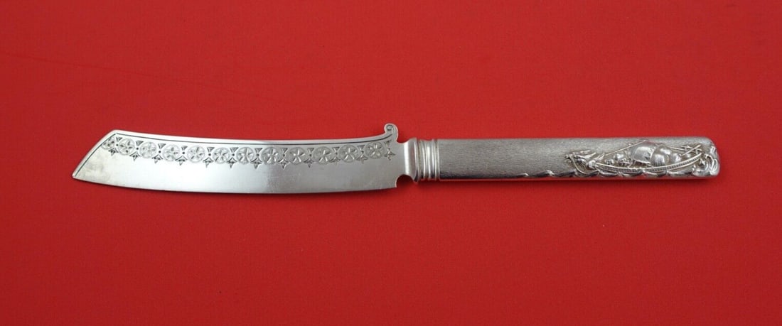 19th Century Sterling Silver Tea Knife with Dragon Design 8": 19th Century Sterling Silver Tea Knife with Dragon Design 8" This exquisite 8-inch Sterling Silver Tea Knife features a beautifully crafted aesthetic hollow handle, adorned with an oriental Chinese bo
