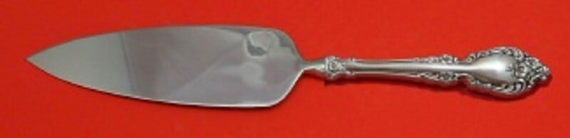 Oneida Botticelli Sterling Silver Cake Server 10.5 Custom Hollow Handle: Oneida Botticelli Sterling Silver Cake Server 10.5 Custom Hollow Handle Introducing the Botticelli Cake Server by Oneida, a stunning addition to your dining collection. This custom-made sterling silve