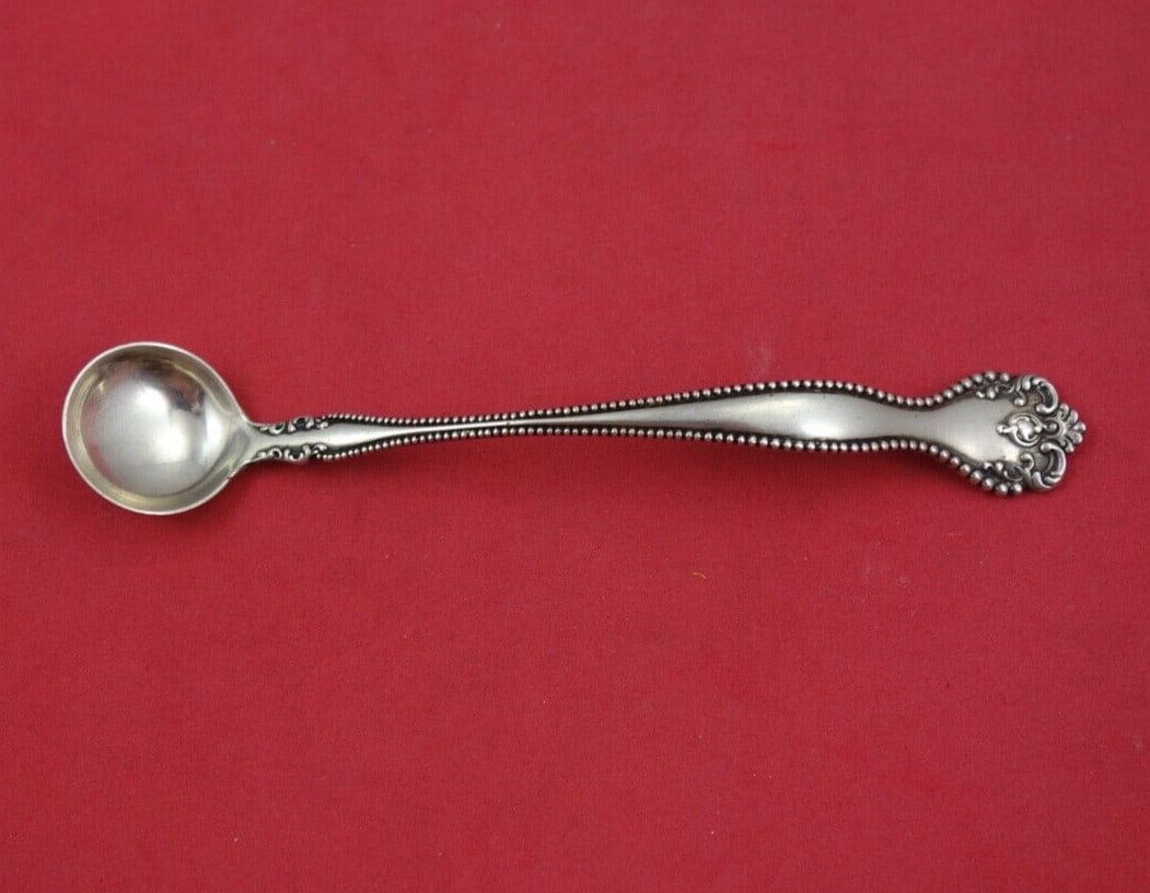 Alvin Raleigh Sterling Silver Mustard Ladle Custom Made 5.5": Alvin Raleigh Sterling Silver Mustard Ladle Custom Made 5.5" This exquisite mustard ladle is part of the Raleigh pattern by Alvin, crafted from high-quality sterling silver. Measuring 5 1/2 inches, th