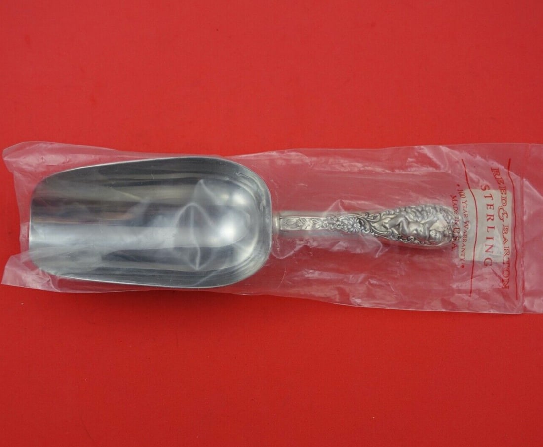 Dominick & Haff Labors of Cupid Sterling Silver Ice Scoop 9": Dominick & Haff Labors of Cupid Sterling Silver Ice Scoop 9" Introducing the exquisite Labors of Cupid ice scoop by Dominick & Haff, crafted from high-quality sterling silver. This elegant serving pie