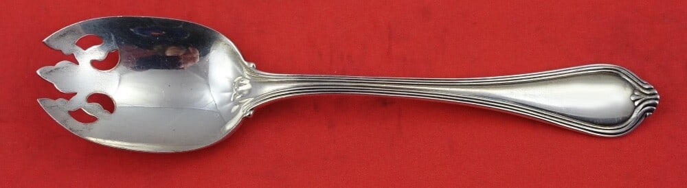 Towle Paul Revere Sterling Silver Pierced Ice Cream Fork 5.5": Towle Paul Revere Sterling Silver Pierced Ice Cream Fork 5.5" This exquisite Paul Revere ice cream fork is crafted from high-quality sterling silver and measures 5 1/2 inches in length. The fork featu