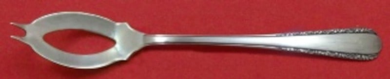 Olive Spoon in Moonglow Pattern Sterling Silver by International 6 Inch Custom Made: Olive Spoon in Moonglow Pattern Sterling Silver by International 6 Inch Custom Made This is a custom-made slotted olive spoon from International in the Moonglow pattern. Crafted from sterling silver,