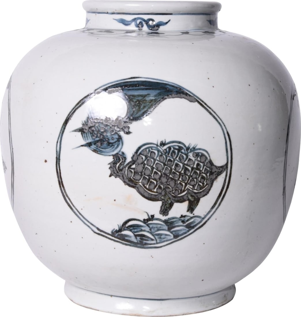 Handmade Chinoiserie Ceramic Jar with Crane Turtle Design: Handmade Chinoiserie Ceramic Jar with Crane Turtle Design This elegant ceramic jar features a captivating crane and turtle motif, perfect for adding a touch of Chinoiserie style to your decor. Handmad
