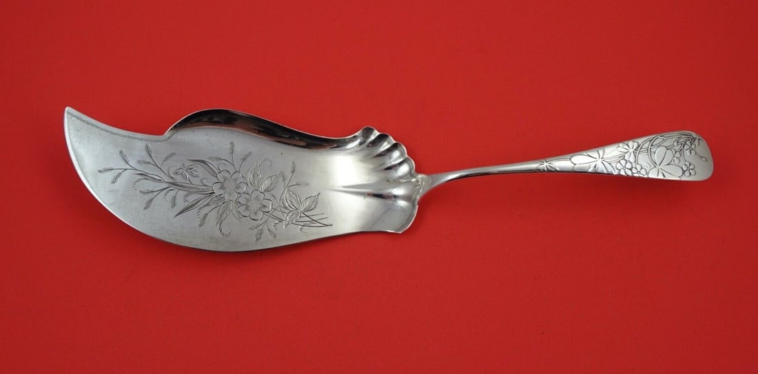 Frank Whiting Oxalis Sterling Silver Fish Serving Knife 11 1/4" Brite-Cut Blade: Frank Whiting Oxalis Sterling Silver Fish Serving Knife 11 1/4" Brite-Cut Blade This exquisite fish serving knife from the Oxalis pattern, crafted by Frank Whiting, showcases a stunning brite-cut blad