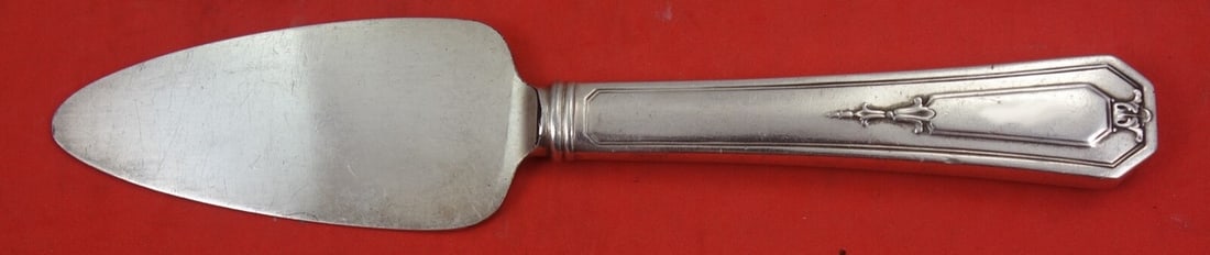 Wallace Princess Mary Sterling Silver Cheese Server 6 1/4 Inch: Wallace Princess Mary Sterling Silver Cheese Server 6 1/4 Inch This exquisite cheese server, crafted by Wallace, features a hollow handle made of sterling silver and a plated blade. The server measure