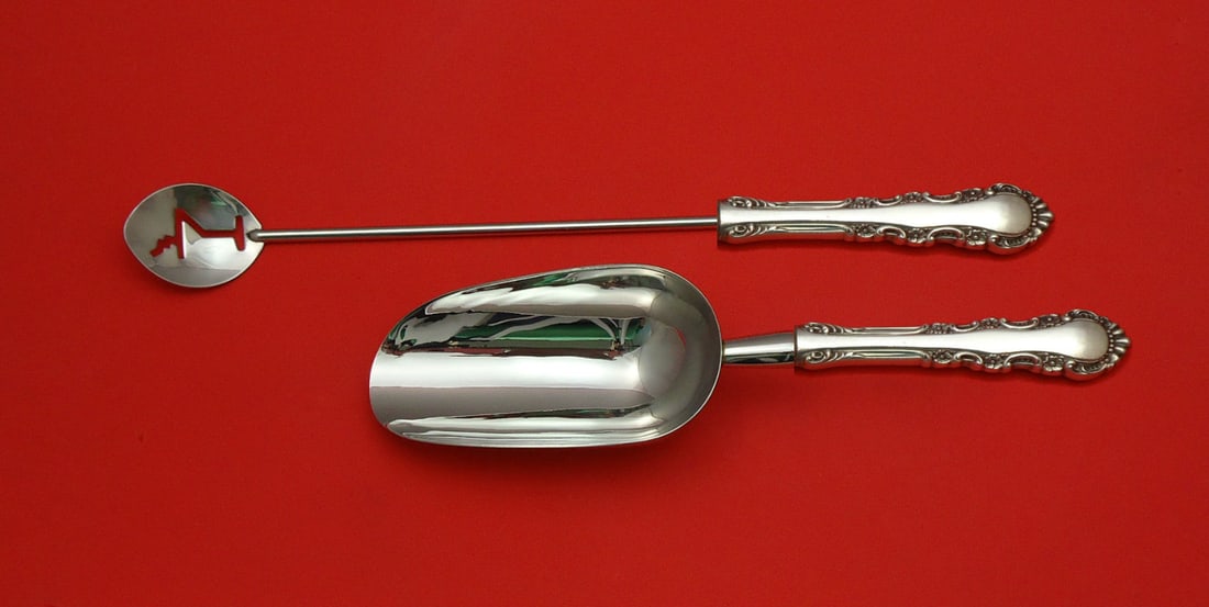 Reed & Barton Georgian Rose Sterling Silver 2pc Bar Set: Reed & Barton Georgian Rose Sterling Silver 2pc Bar Set This exquisite 2-piece bar set from Reed & Barton features the elegant Georgian Rose pattern. Crafted from sterling silver, the set includes a c