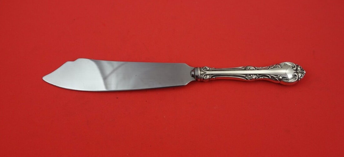 Birks Laurentian Sterling Silver Cake Knife 10 Inch Old Fashioned: Birks Laurentian Sterling Silver Cake Knife 10 Inch Old Fashioned This exquisite cake knife from the Laurentian pattern by Birks is crafted from sterling silver with a hollow handle and a durable stai