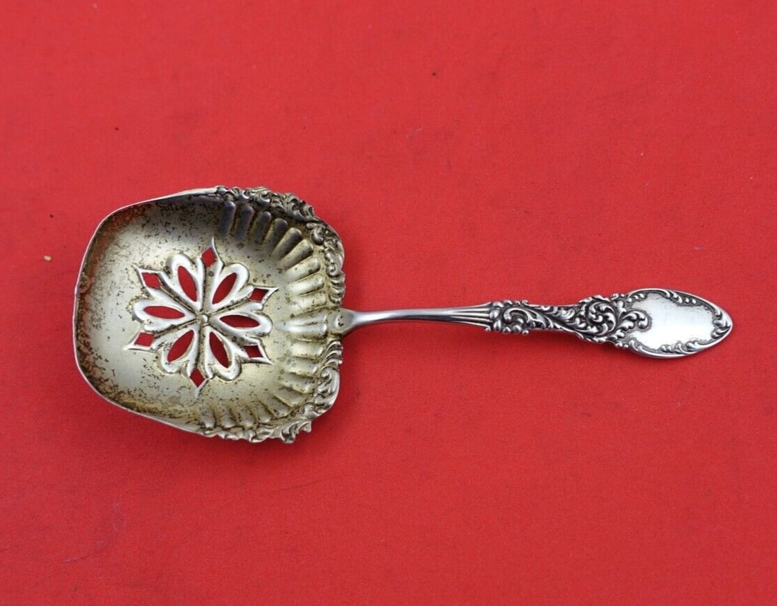Frank Whiting Tyrolean Sterling Silver Nut Spoon 4.75: Frank Whiting Tyrolean Sterling Silver Nut Spoon 4.75 Enhance your serving collection with this exquisite Tyrolean Nut Spoon by Frank M. Whiting. Crafted from high-quality sterling silver, this 4 3/4"