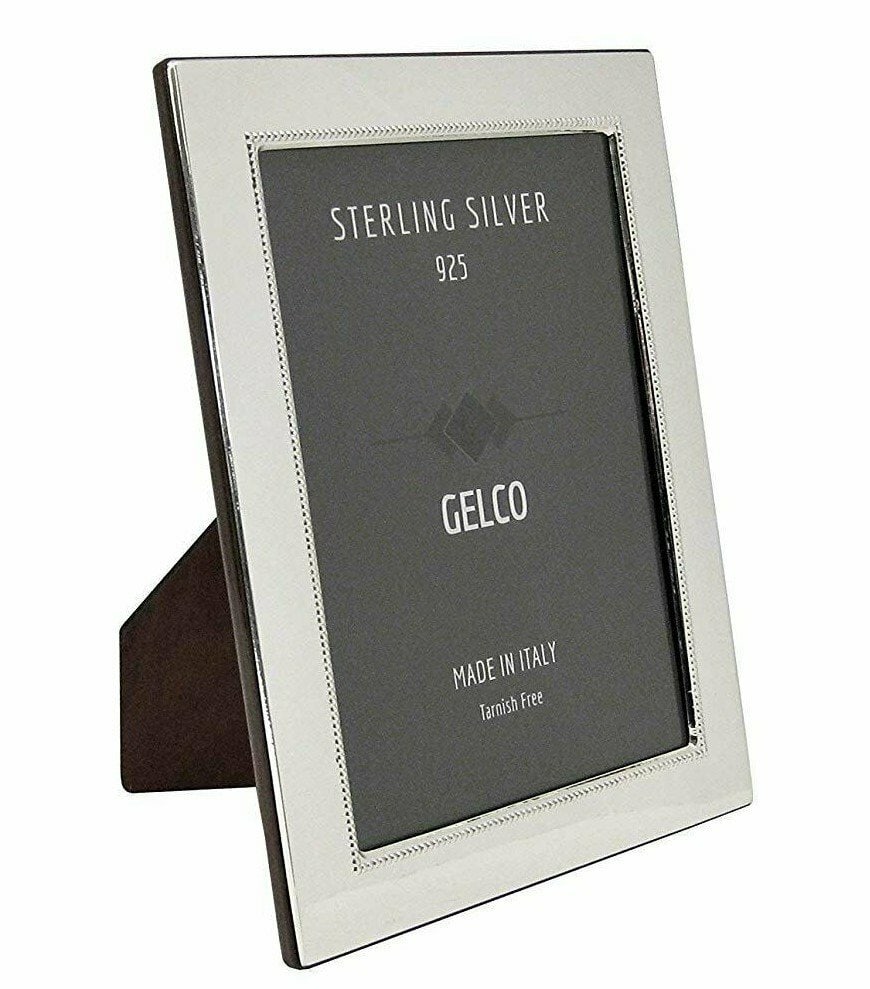 Sterling Silver and Wood Photo Frame with Glossy Pearl Border: Sterling Silver and Wood Photo Frame with Glossy Pearl Border This photo frame features a combination of 925 sterling silver and glossy wood with a pearl border design. It provides an elegant way to d