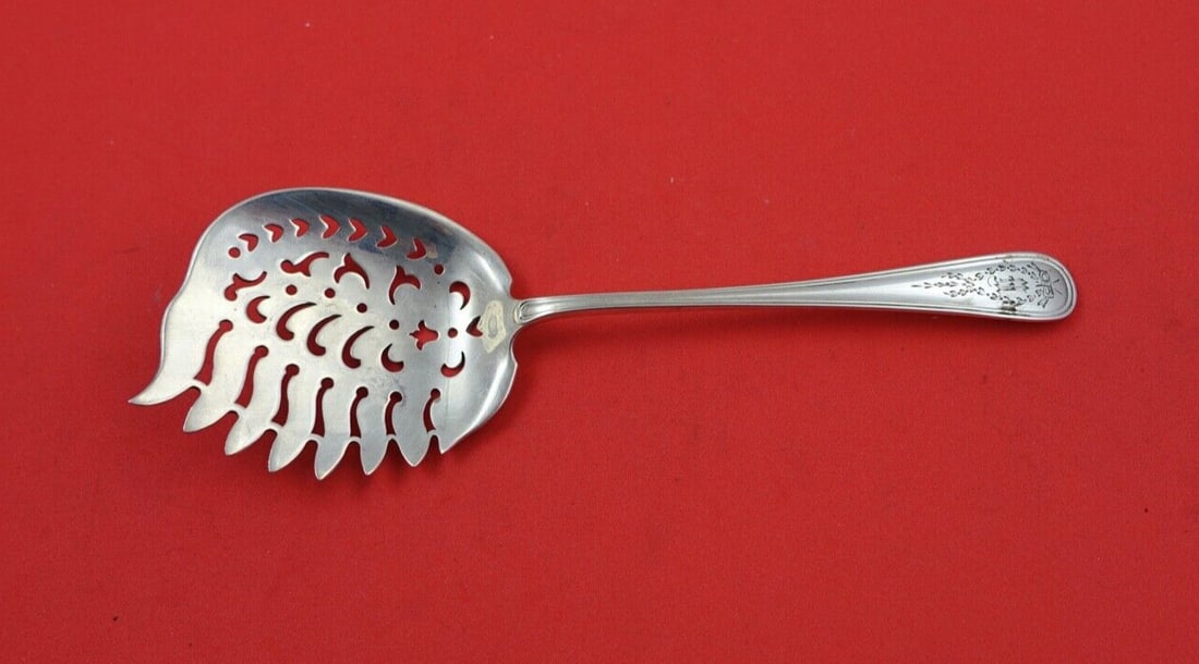 Gorham Jefferson Sterling Silver Cucumber Server 7-Tine 6 1/4 Inch: Gorham Jefferson Sterling Silver Cucumber Server 7-Tine 6 1/4 Inch This exquisite 7-tine pierced cucumber server from the Jefferson pattern by Gorham is crafted from high-quality sterling silver. Meas