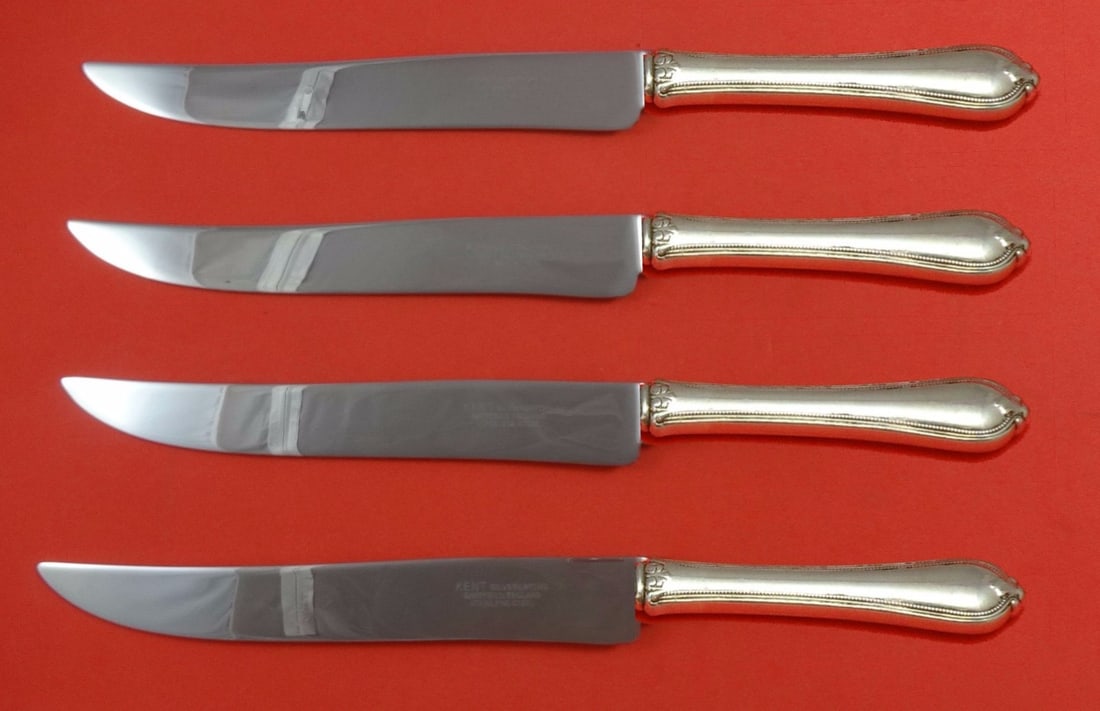 Towle Old Newbury Sterling Silver Steak Knife Set 4pc Texas Sized: Towle Old Newbury Sterling Silver Steak Knife Set 4pc Texas Sized This exquisite 4-piece steak knife set features the Old Newbury pattern by Towle, crafted from sterling silver with hollow handles and