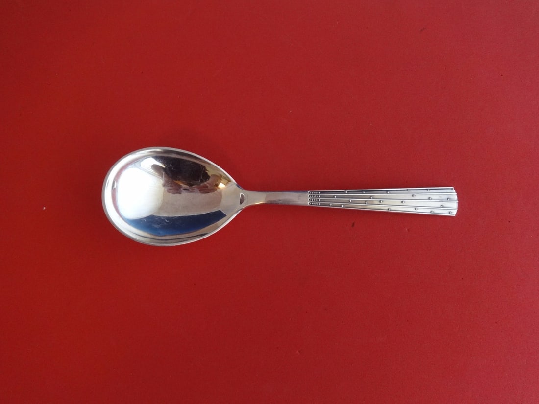Orla Vagn Mogensen Champagne Sterling Silver Berry Spoon 8.25": Orla Vagn Mogensen Champagne Sterling Silver Berry Spoon 8.25" This exquisite berry spoon from the Champagne pattern, also known as Design #12, is crafted from high-quality sterling silver. Made by th
