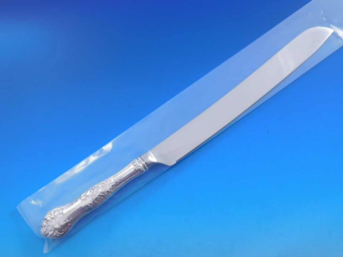 Custom Holly Pattern Wedding Cake Knife by EHH Smith National Silverplate: Custom Holly Pattern Wedding Cake Knife by EHH Smith National Silverplate Presenting the exquisite Holly Wedding Cake Knife, a custom-made piece crafted by EHH Smith for National. This elegant knife f