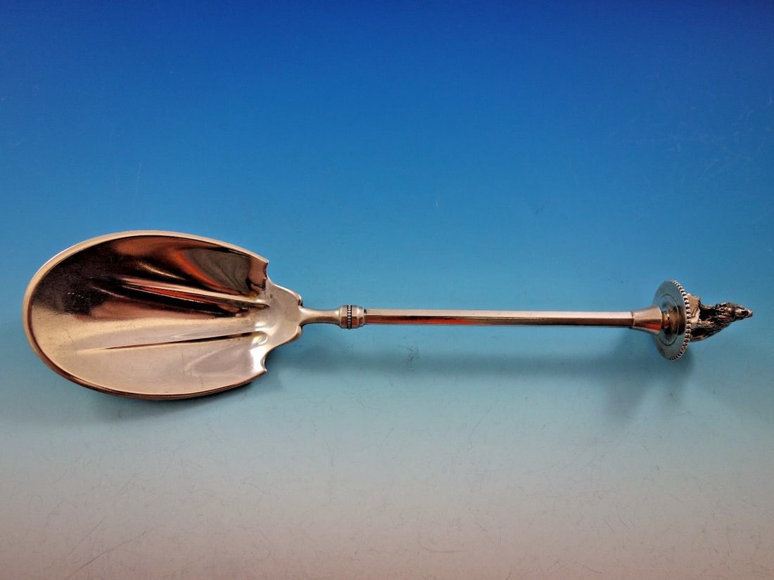 Gorham Polar Bear Sterling Silver Ice Spoon 3D Handle 10 1/4 inches: Gorham Polar Bear Sterling Silver Ice Spoon 3D Handle 10 1/4 inches This exquisite ice spoon, crafted by Gorham in the Polar Bear pattern, showcases a stunning 3D polar bear on its handle. Measuring 1