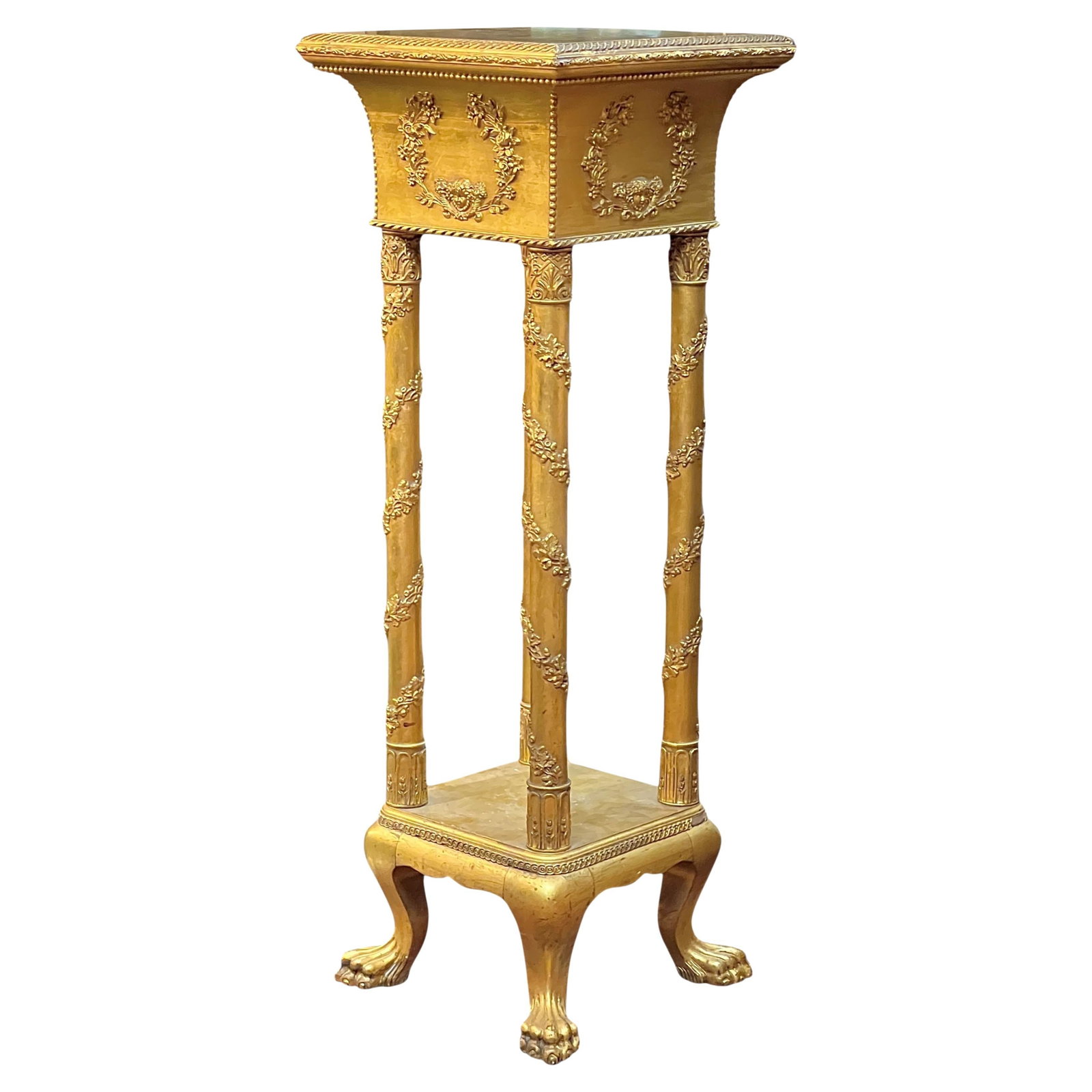 Empire Style French Giltwood Carved Plant Stand with Neoclassical Motifs: Empire Style French Giltwood Carved Plant Stand with Neoclassical Motifs This antique French pedestal or plant stand is crafted in the Empire style, featuring hand-carved wood with a gilt finish. It s