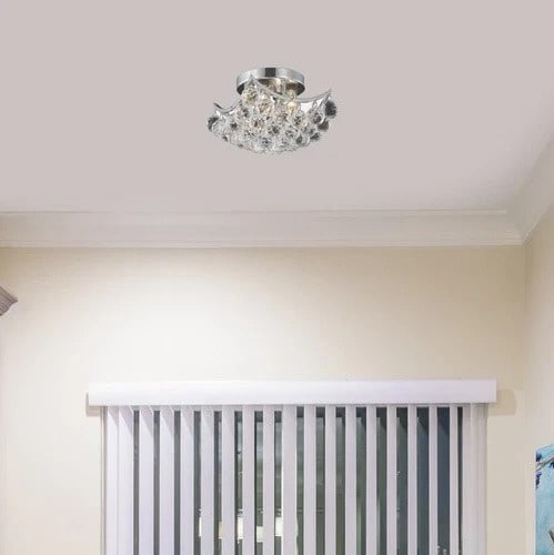 Corona Collection Chrome Crystal Flush Mount Ceiling Chandelier 10 Inch 4 Light: Corona Collection Chrome Crystal Flush Mount Ceiling Chandelier 10 Inch 4 Light This modern flush mount chandelier features a chrome finish and royal cut clear crystal teardrops for an elegant lightin
