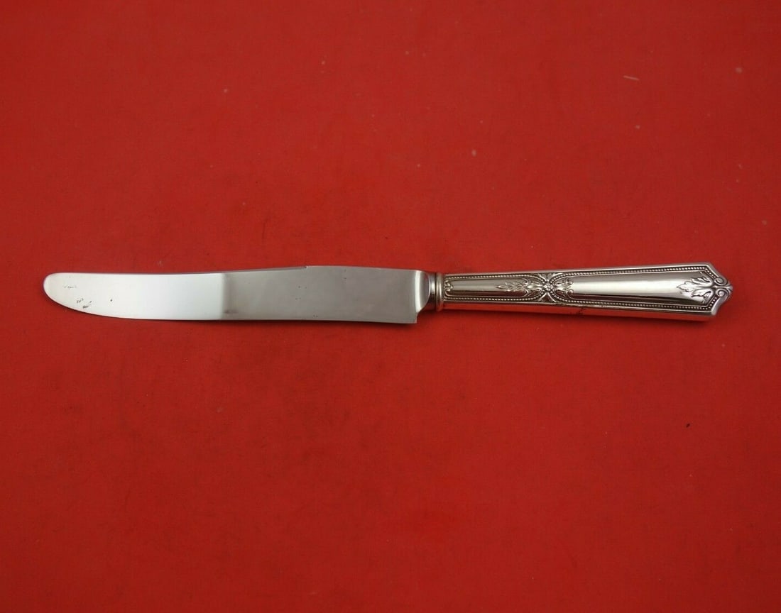 Alvin Regent Sterling Silver Vintage Dinner Knife 9 5/8": Alvin Regent Sterling Silver Vintage Dinner Knife 9 5/8" This elegant dinner knife is a part of the Regent pattern by Alvin, crafted from high-quality sterling silver with a stainless steel blade. Mea