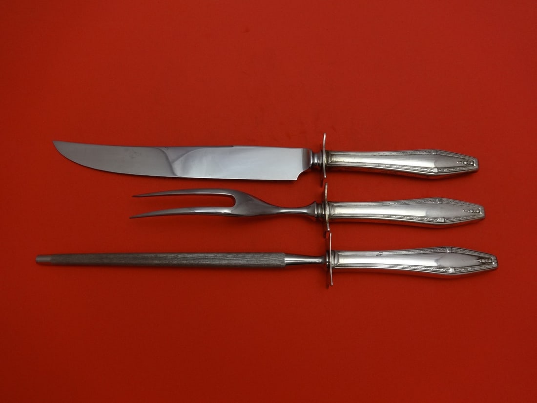 State House Formality Sterling Silver Steak Carving Set 3pc: State House Formality Sterling Silver Steak Carving Set 3pc Enhance your dining experience with the Formality by State House Sterling Silver Steak Carving Set. This exquisite 3-piece set features a ho