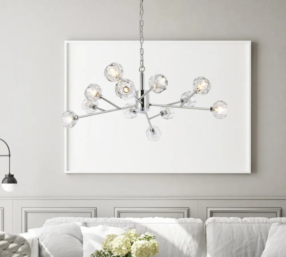 Modern Sputnik Chandelier with 12 Lights and Crystal Shades 35 Inch Chrome Finish: Modern Sputnik Chandelier with 12 Lights and Crystal Shades 35 Inch Chrome Finish This modern Sputnik-style chandelier features a chrome-plated finish and twelve lights, each with a clear crystal shad