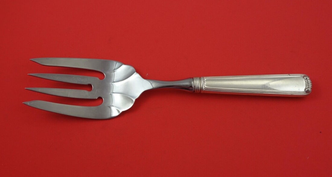 Marie Louise Sterling Silver Meat Fork by Blackinton Towle 9 3/4": Marie Louise Sterling Silver Meat Fork by Blackinton Towle 9 3/4" Experience elegance with the Marie Louise meat fork, crafted by Blackinton and Towle. This exquisite piece features a hollow handle ma
